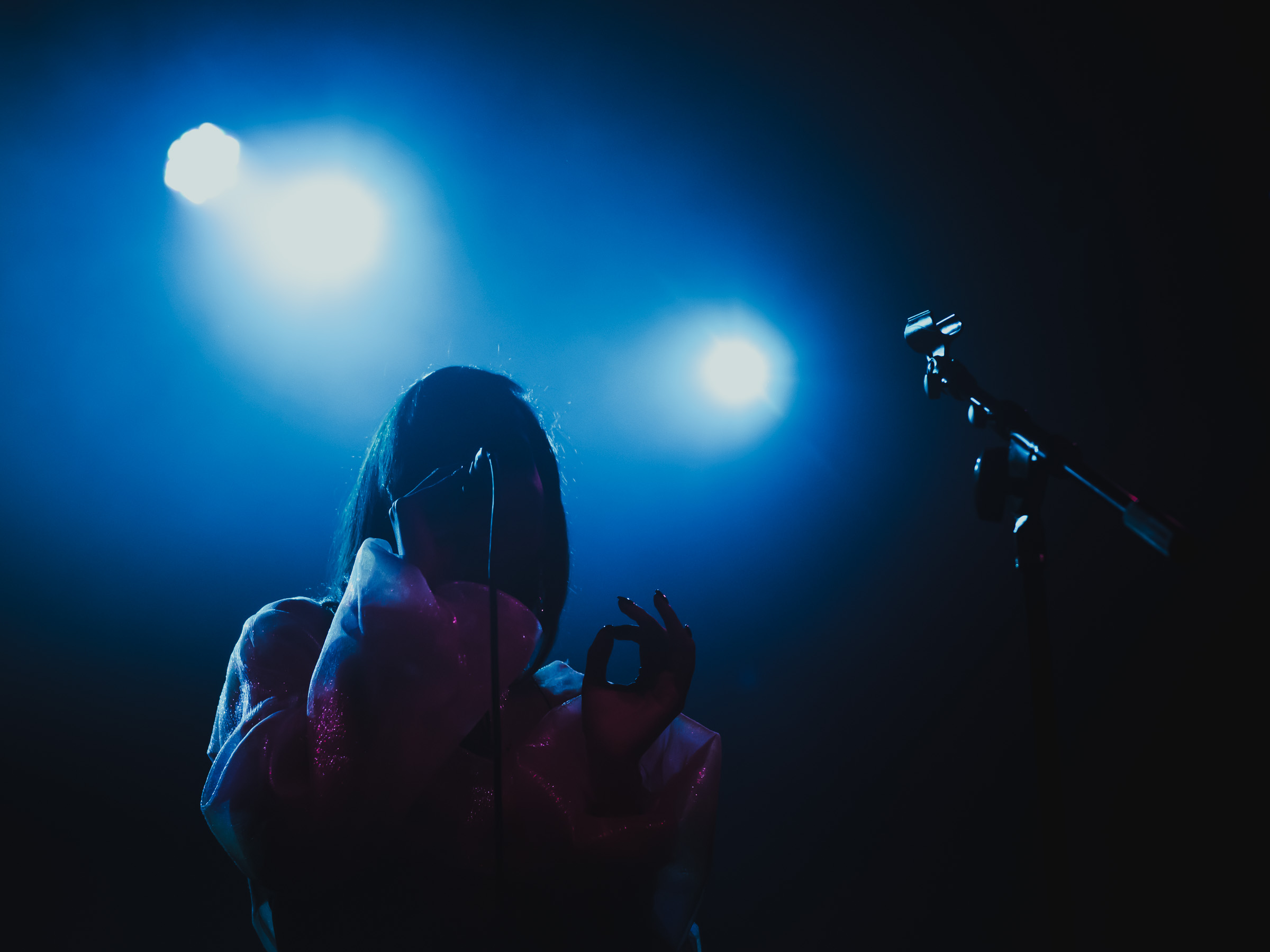 Snoh Alegra Singing into Microphone