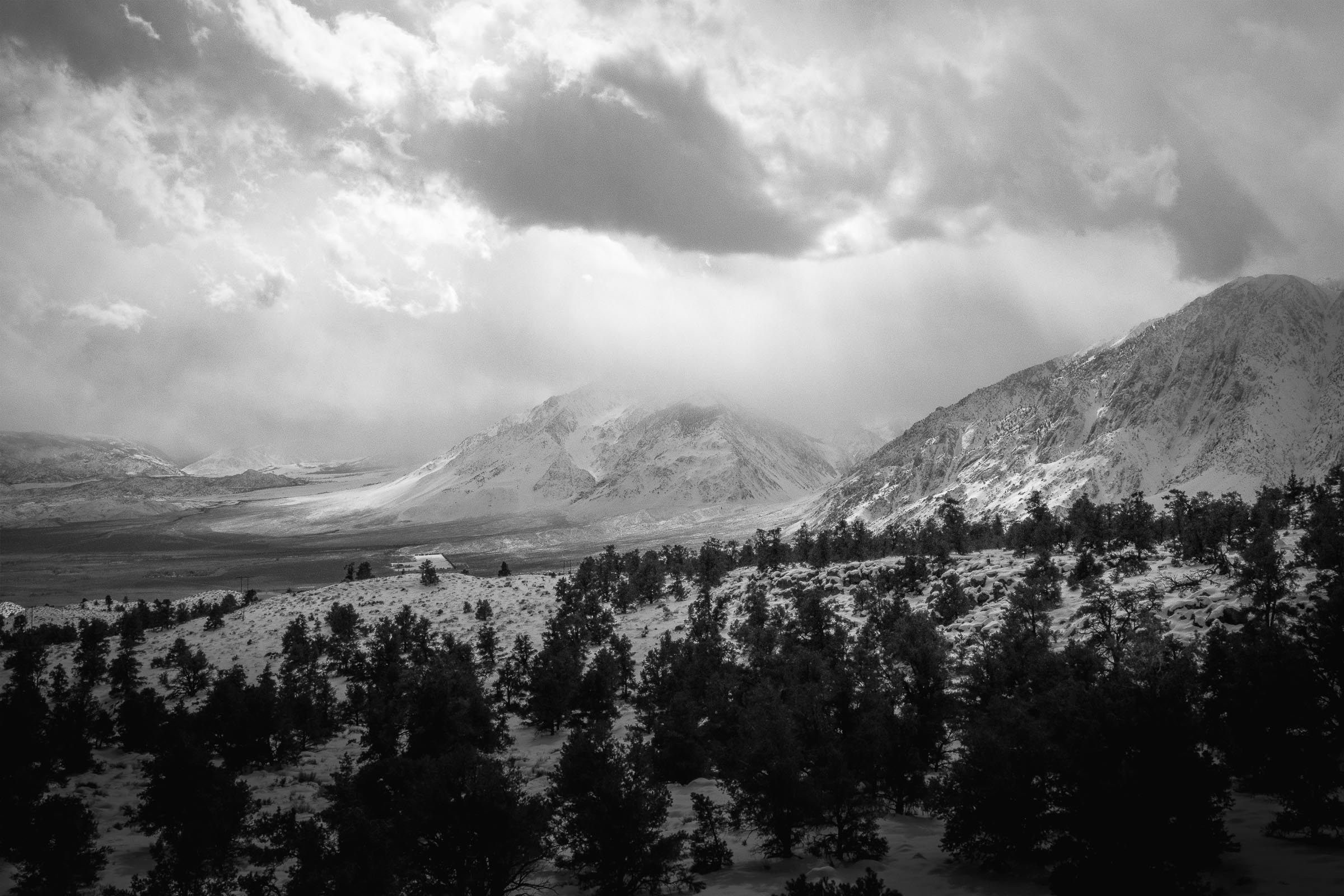 Dark Moody Fine Art Landscape of a Snow Storm in the Mountains